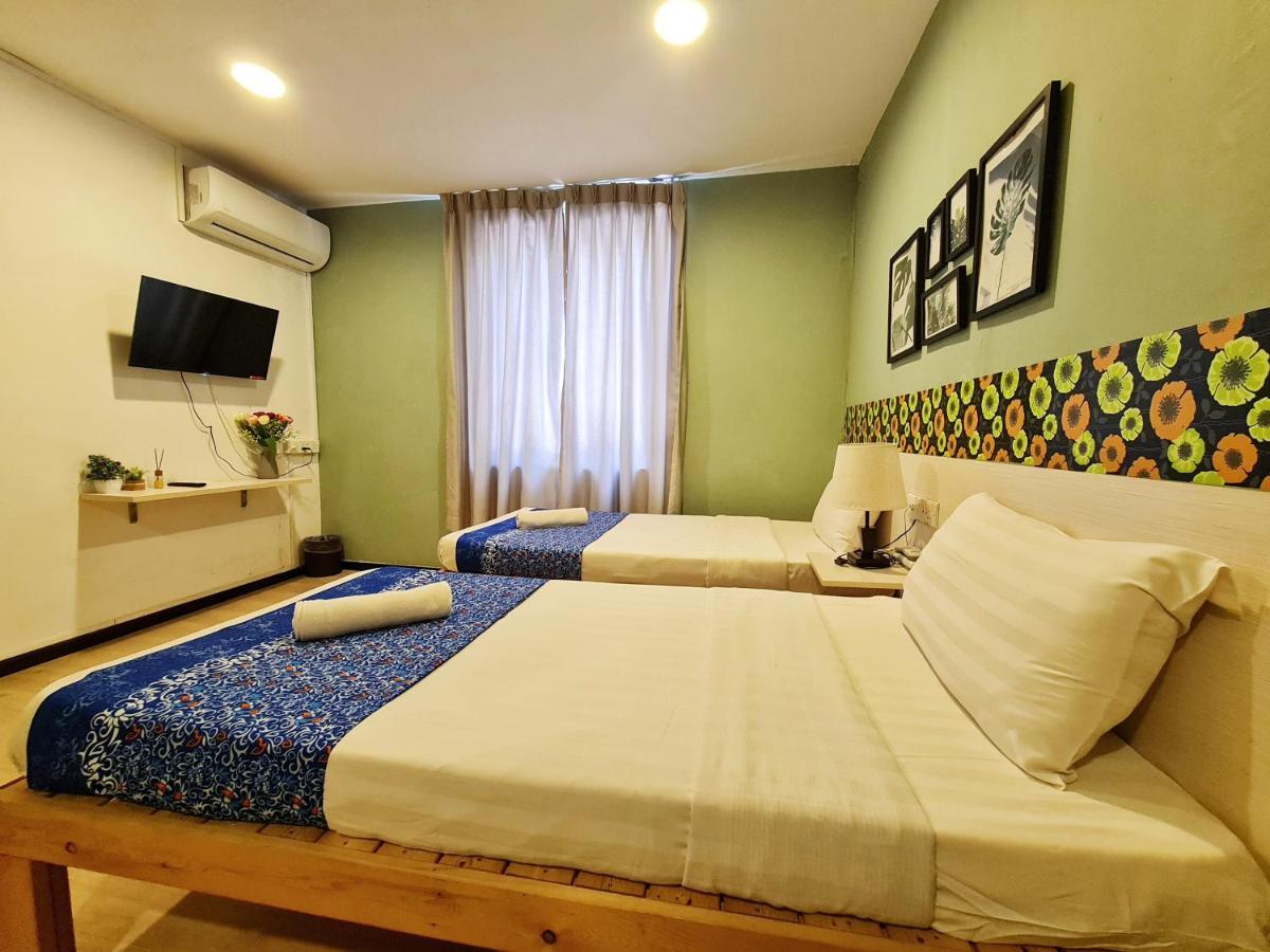 Treeline Urban Inn Кота-Кинабалу Экстерьер фото