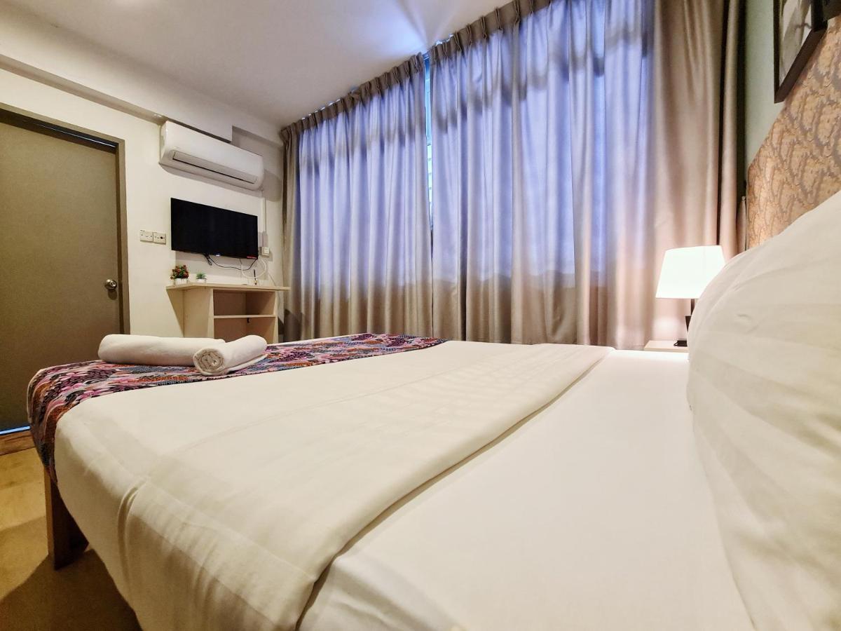 Treeline Urban Inn Кота-Кинабалу Экстерьер фото