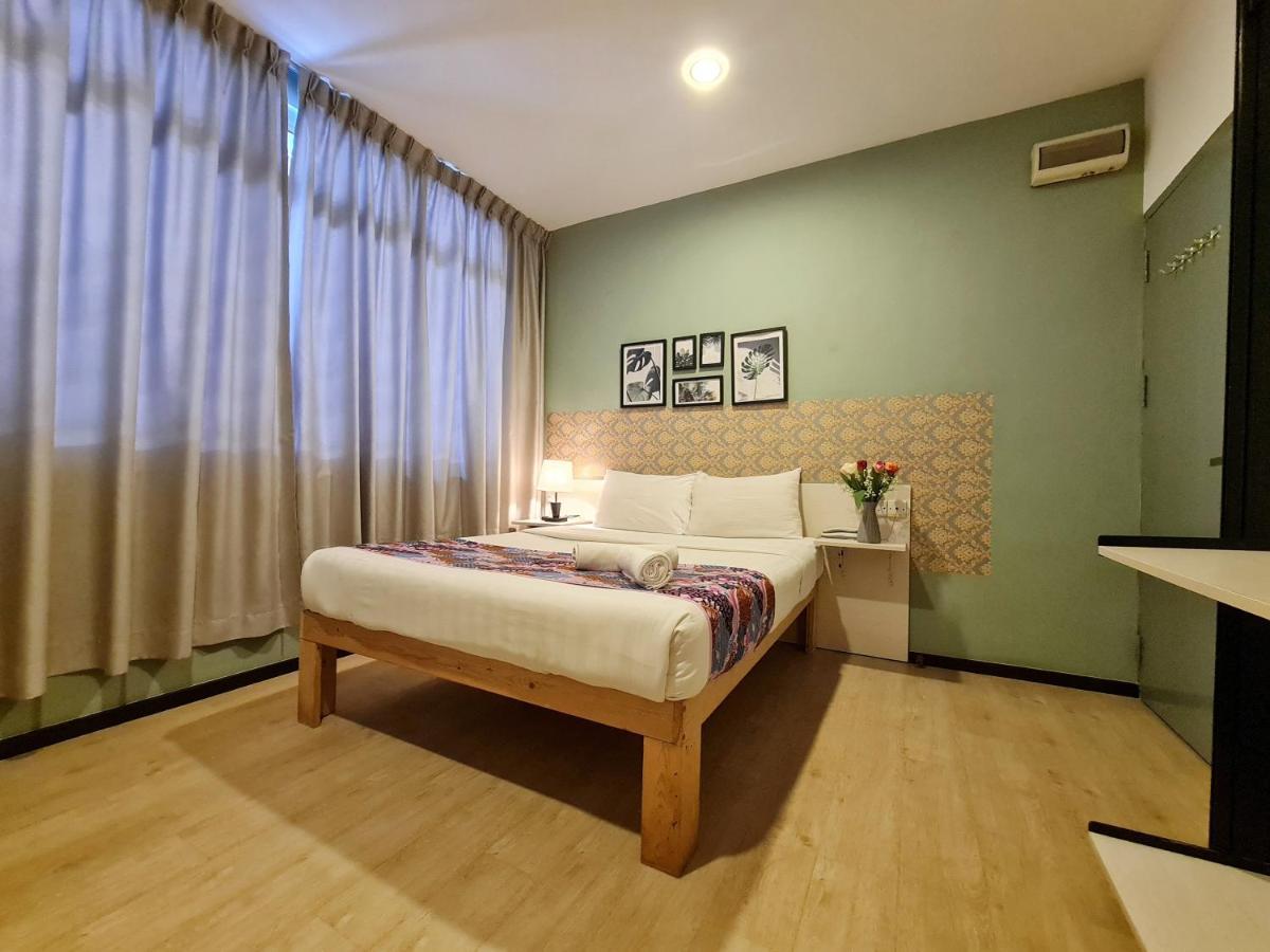 Treeline Urban Inn Кота-Кинабалу Экстерьер фото